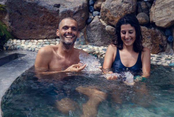 man and women having ice bath